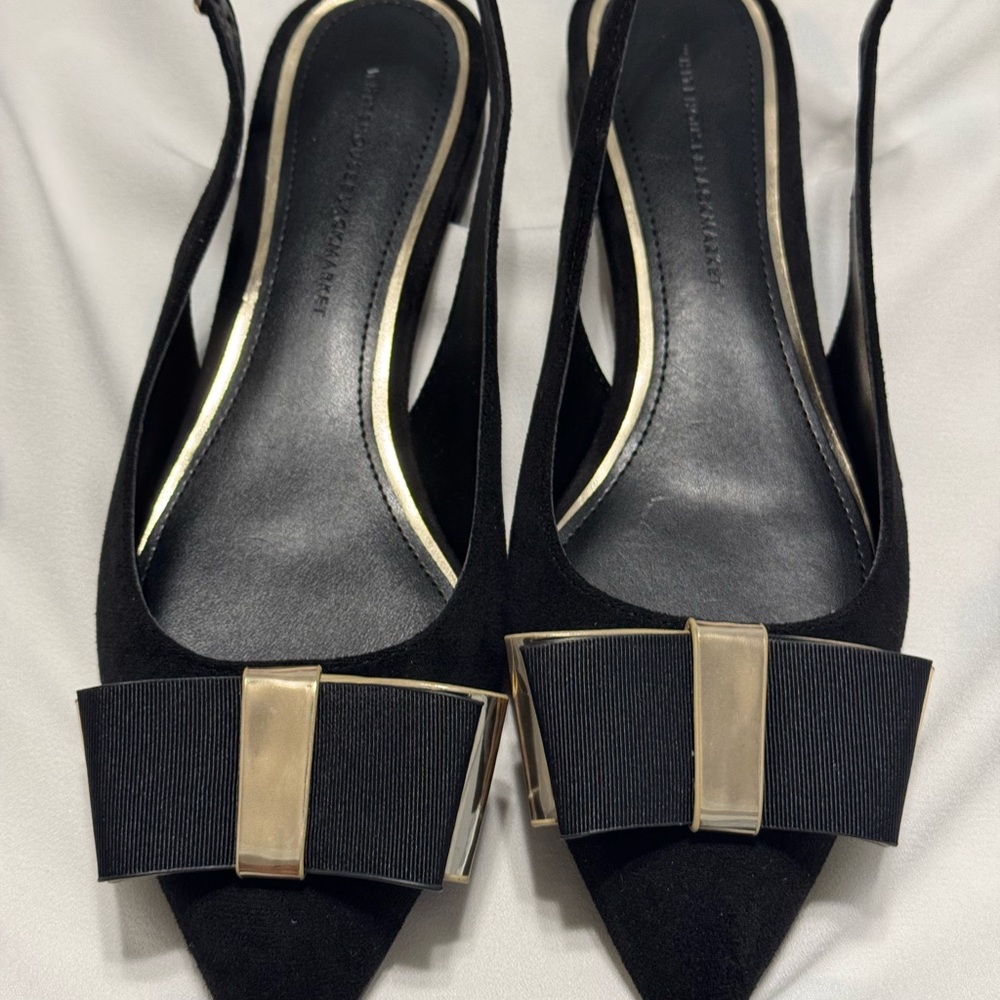 White House Black Market Gold and Black Flats with Bow Accent